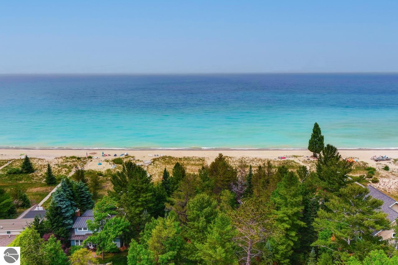 Image for Sweetest Spot on Sleeping Bear Bay is a drone shot over the sandy walkway to Lake Michigan, shown here in all its turquoise majesty.